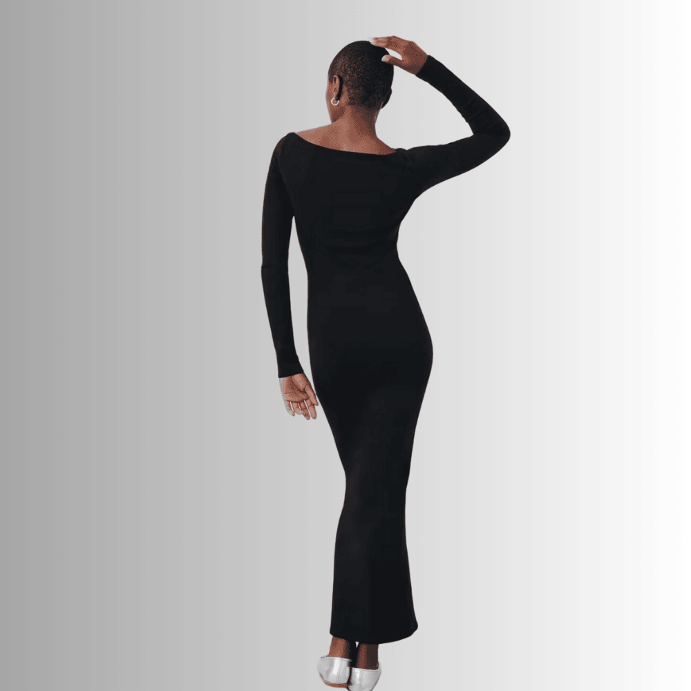 long sleeved black dress with boat neckline and figure hugging fit 2jff7
