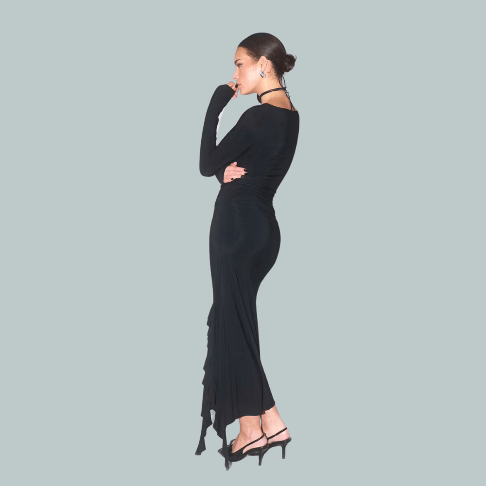 long sleeved black dress with figure hugging fit and front slit i7m52