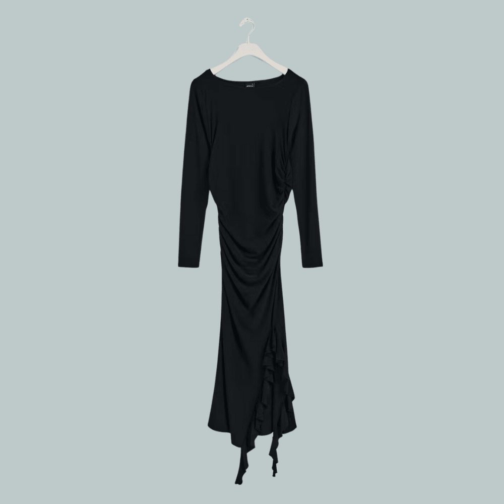 long sleeved black dress with figure hugging fit and front slit